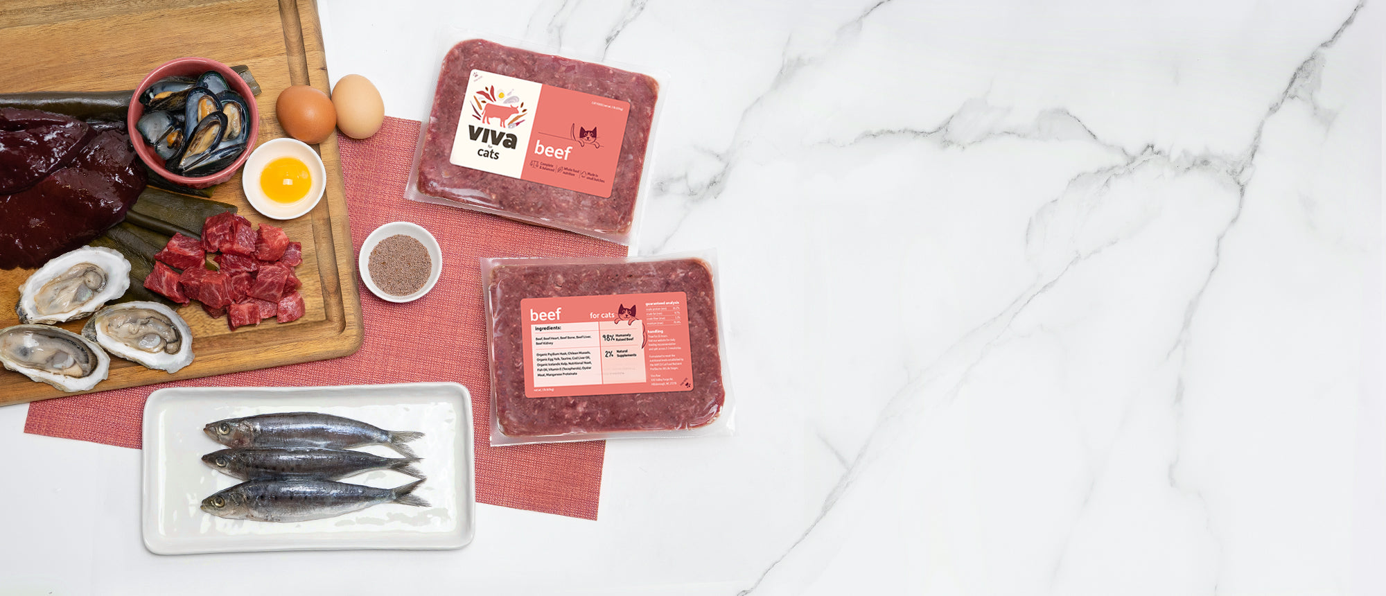 A flatlay of a Viva’s Beef for Cats, with the key ingredients used for the recipe
