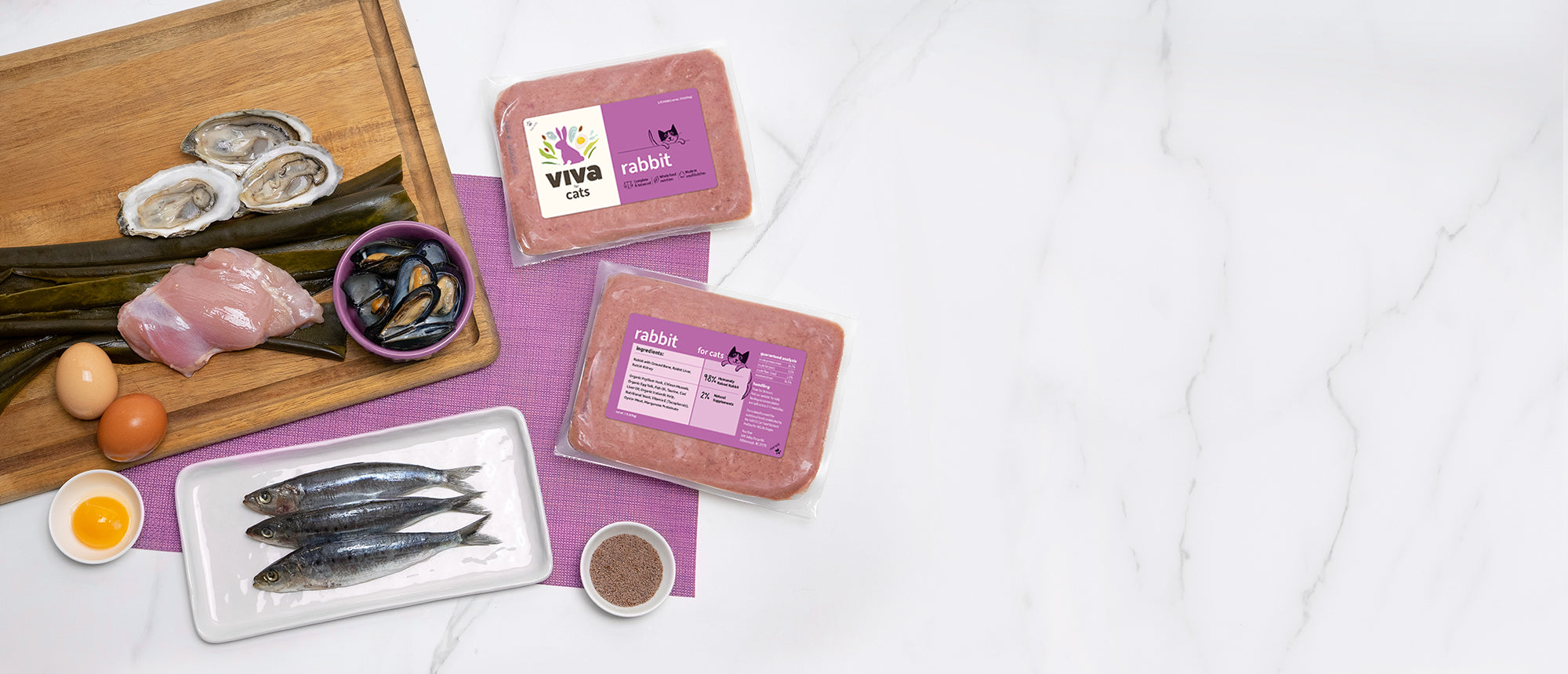 A flatlay of a Viva’s Rabbit for Cats, with the key ingredients used for the recipe