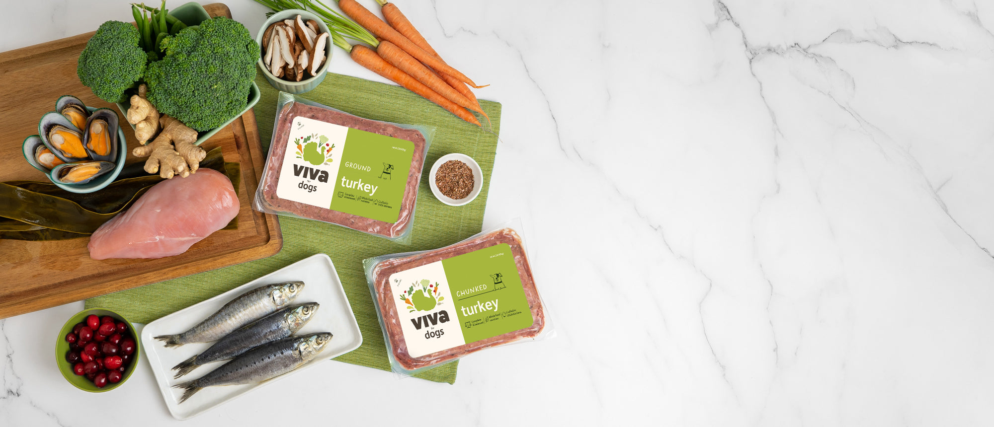 A flatlay of a Viva’s Turkey for Dogs, with the key ingredients used for the recipe